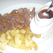 Magret de Canard au pommes Sauce à l'Orange Caramélisée